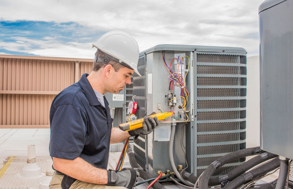 How often should I service my air conditioning unit?